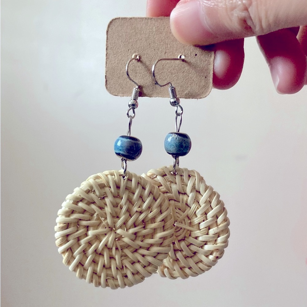 Round beige rattan earrings
